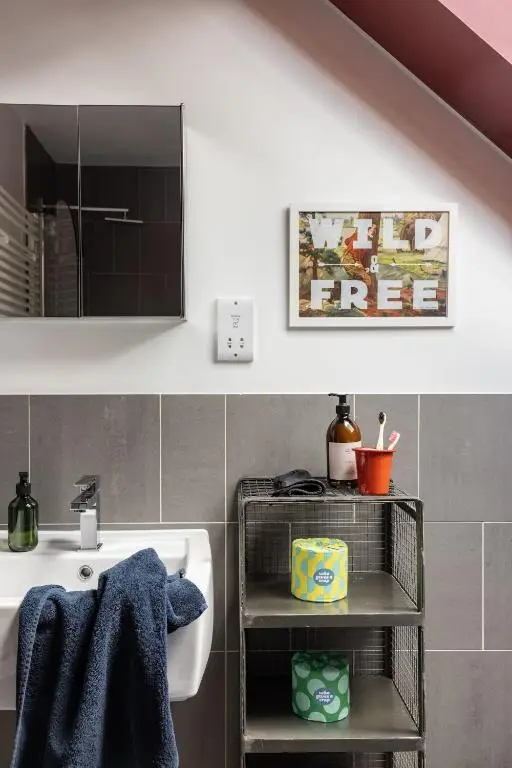 a bathroom with a sink and a mirror at Number 5 Steading Cottage in Banchory