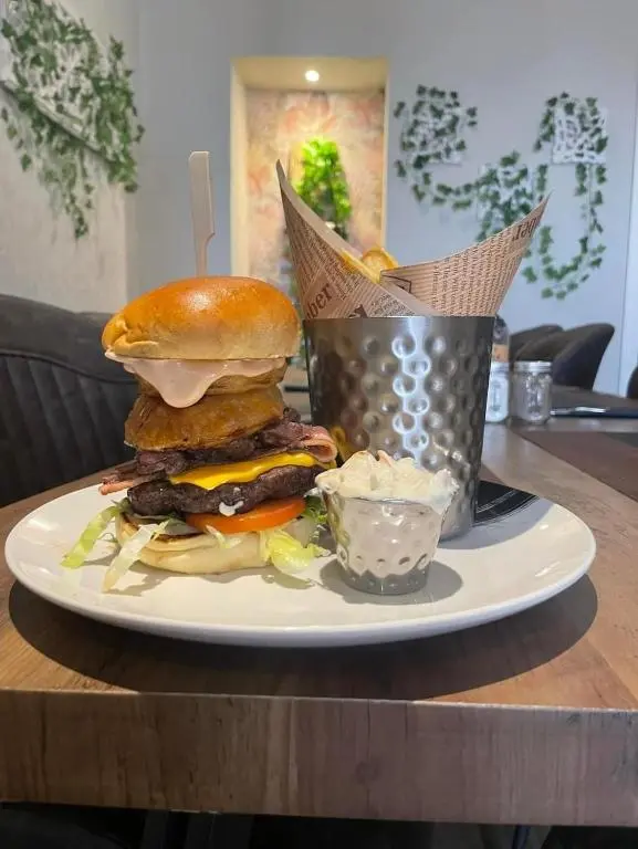 a sandwich on a plate on a table at The Brig & Barrel hotel in Buckie
