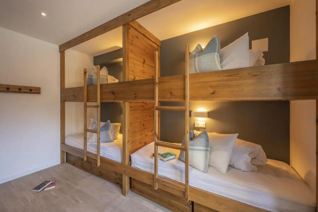 a bedroom with two bunk beds in a room at The Neuk in Kincraig