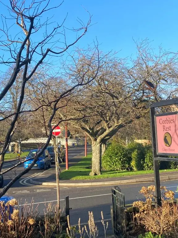 a street sign on the side of a road at Room Only Corbies Rest in Inverness