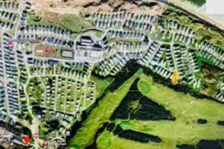 an aerial view of a city with tall buildings at Silver sands holiday park in Lossiemouth