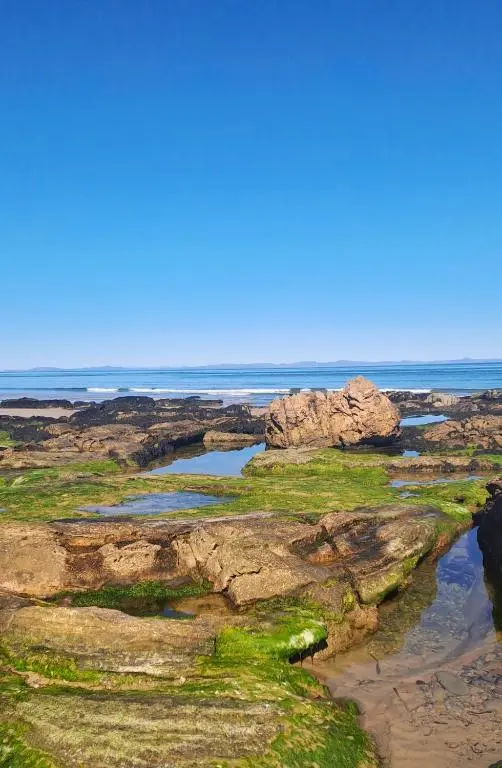 a view of the ocean from a rocky beach at Balormie View in Lossiemouth