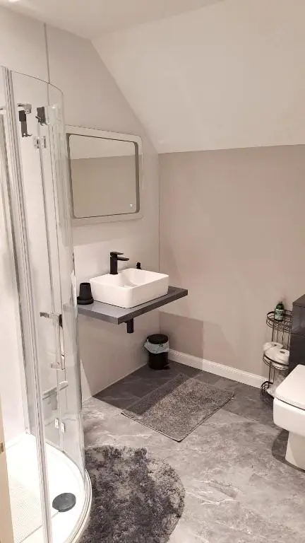 a bathroom with a sink and a toilet at Balormie View in Lossiemouth