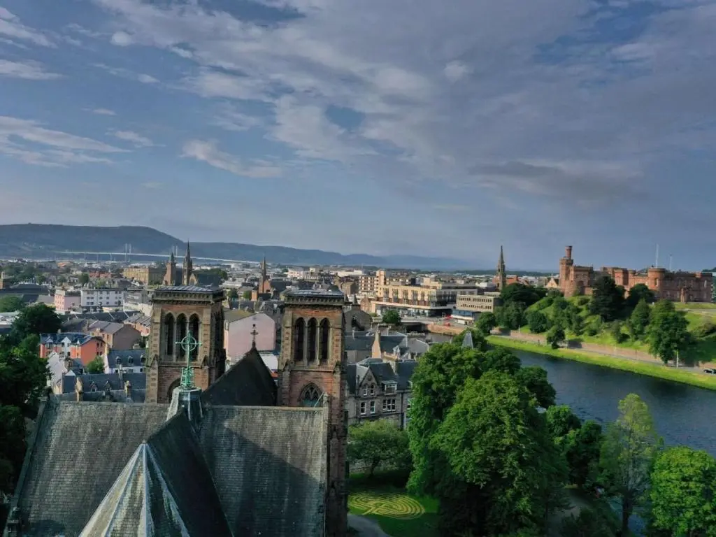 a view of a city with a building and a river at Apartment Druid Temple by Interhome in Inverness