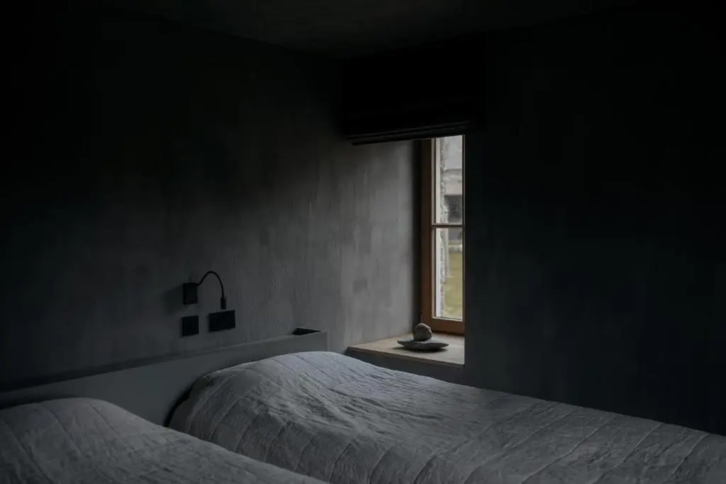 a bedroom with two beds and a window at Inverenzie Cottage, Rooms with a view! in Coilacriech