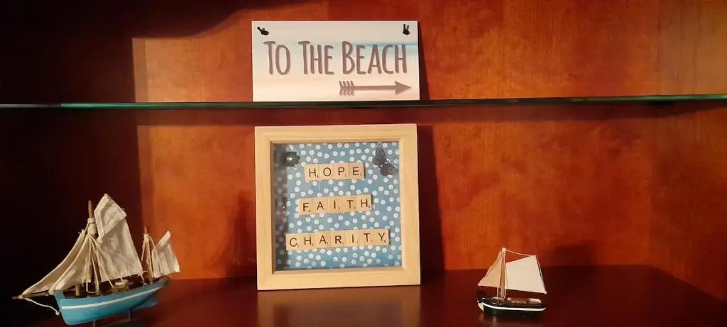 a shelf with two models of boats on a table at Sunnyside Cottage 2 Bedrooms 1 Bathroom 1 WC 2 Pets Welcome in Hilton of Cadboll