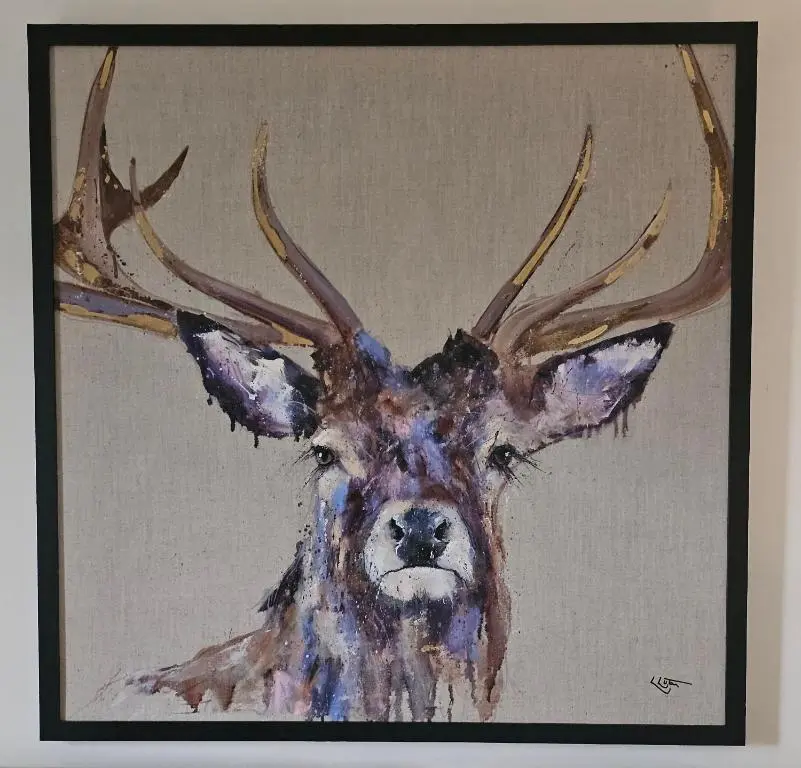 a painting of a deer head with antlers at Serviced Apartment - Aberdeen in Dyce