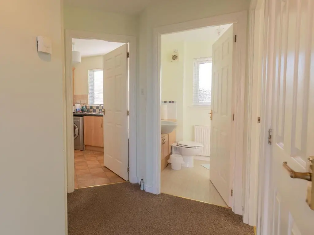 a bathroom with a toilet and a sink at Apartment Ash House by Interhome in Inverness