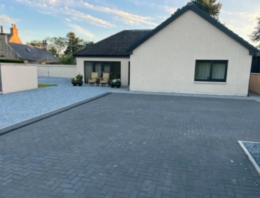 a brick driveway in front of a house at Beldorny in Kingston
