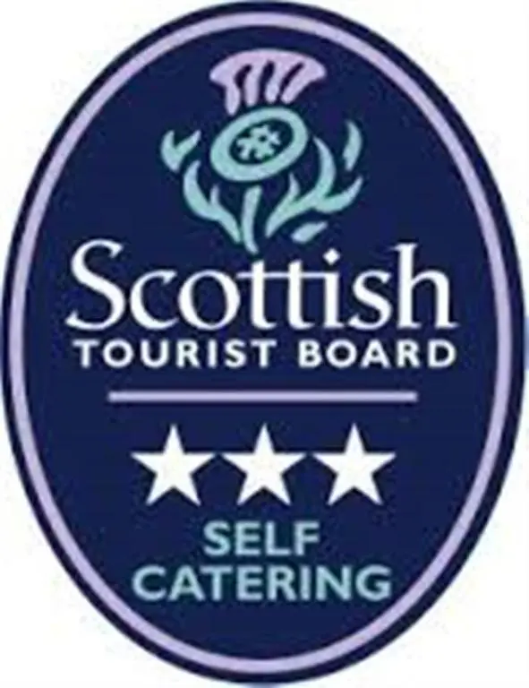 a blue scottish tourist board sign with stars at Ptarmigan Cottage in Aviemore