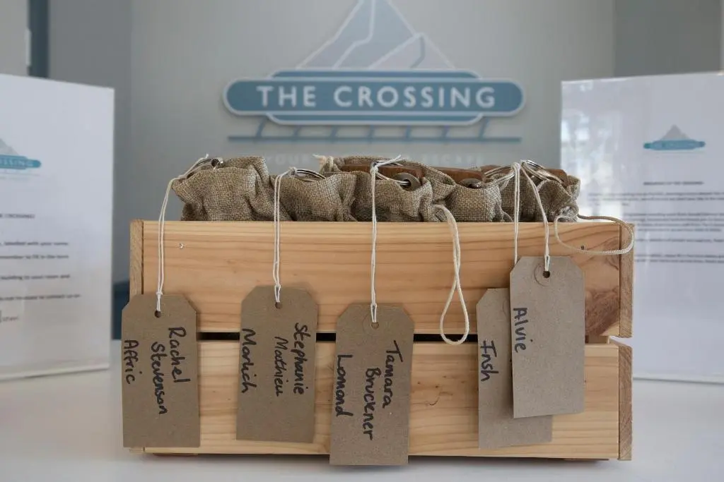 a wooden box with price tags on it at The Crossing in Kingussie
