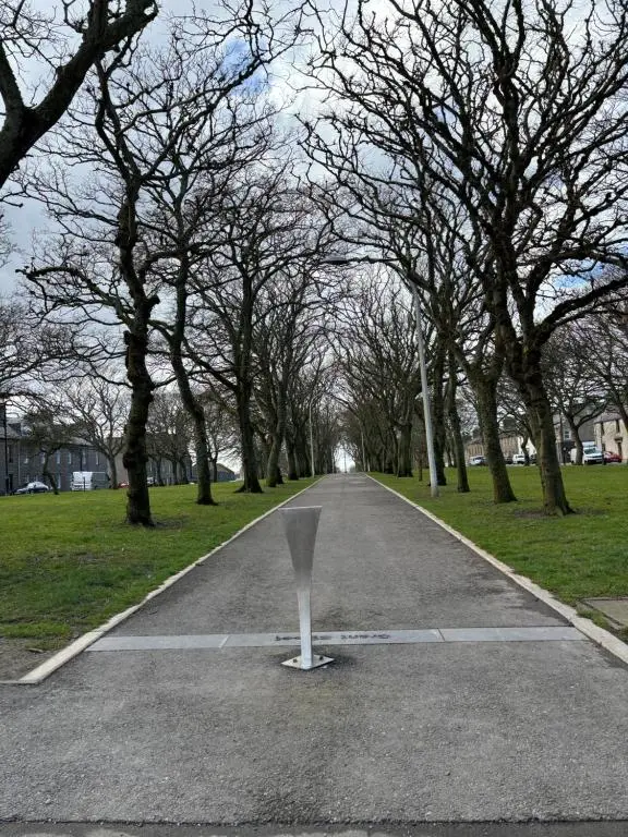 a road with a parking meter in the middle at Argyle House Wick in Wick