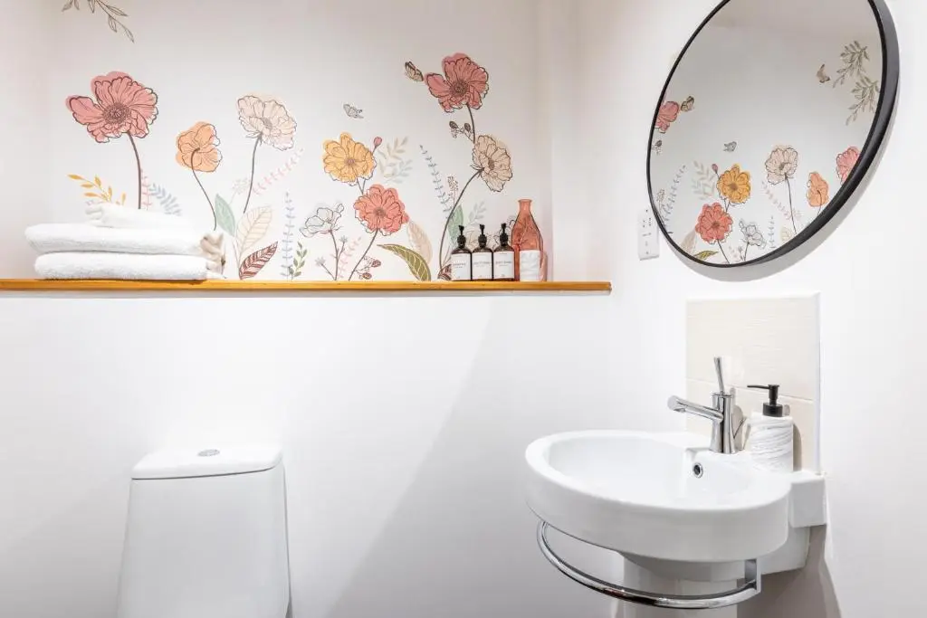 a bathroom with a sink and a mirror at Ness Station in Inverness