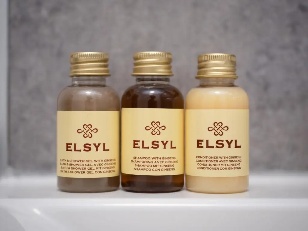 three bottles of honey sitting on a shelf at Apartment Harbour Nights Deluxe 7B by Interhome in Lossiemouth