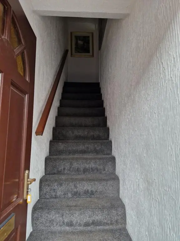 a staircase leading up to the top of a building at No 70G in Inverness