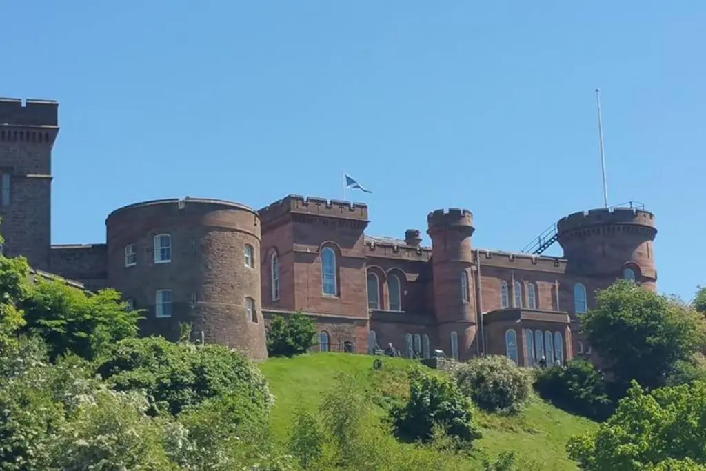 an old castle on top of a hill at Heather House, beautiful family home, sleeps 8 in Inverness