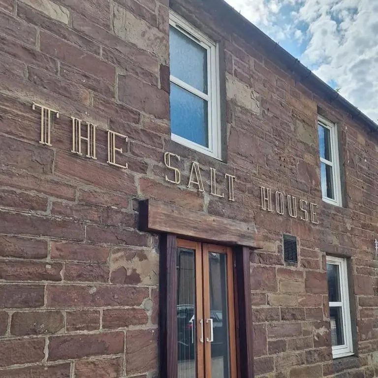 a red brick building with the salt house on it at The Salt house in Golspie