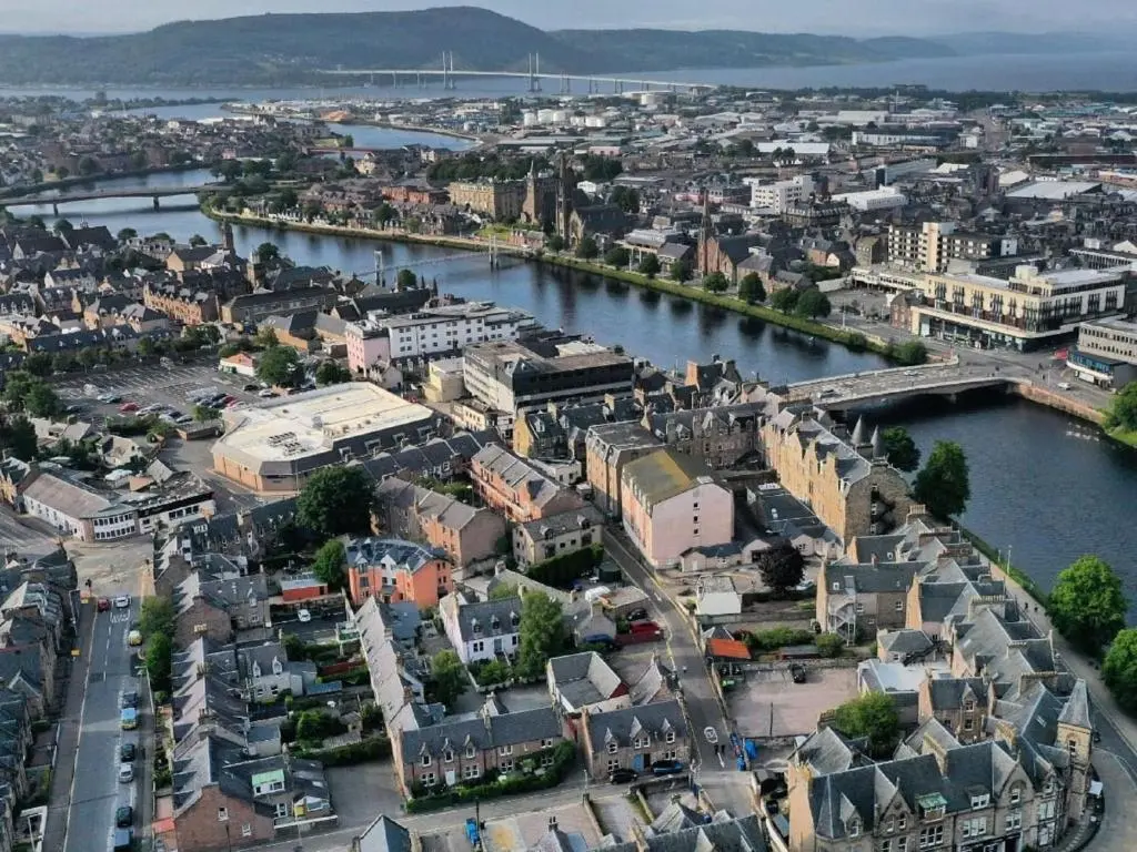 an aerial view of a city with a river at Holiday Home Kincraig by Interhome in Inverness
