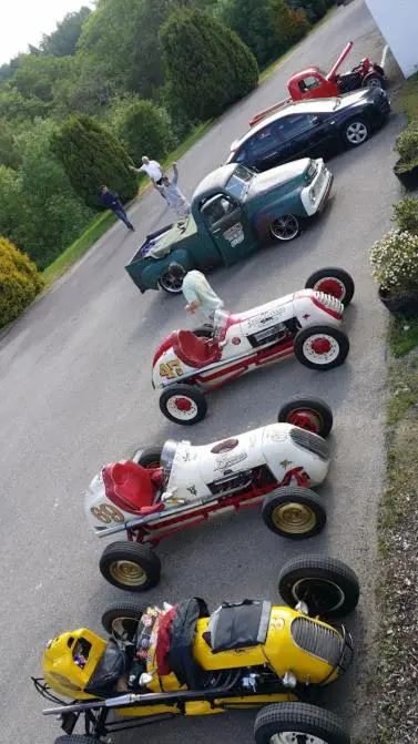 a group of toy cars parked on a road at Achilty Guest House in Contin