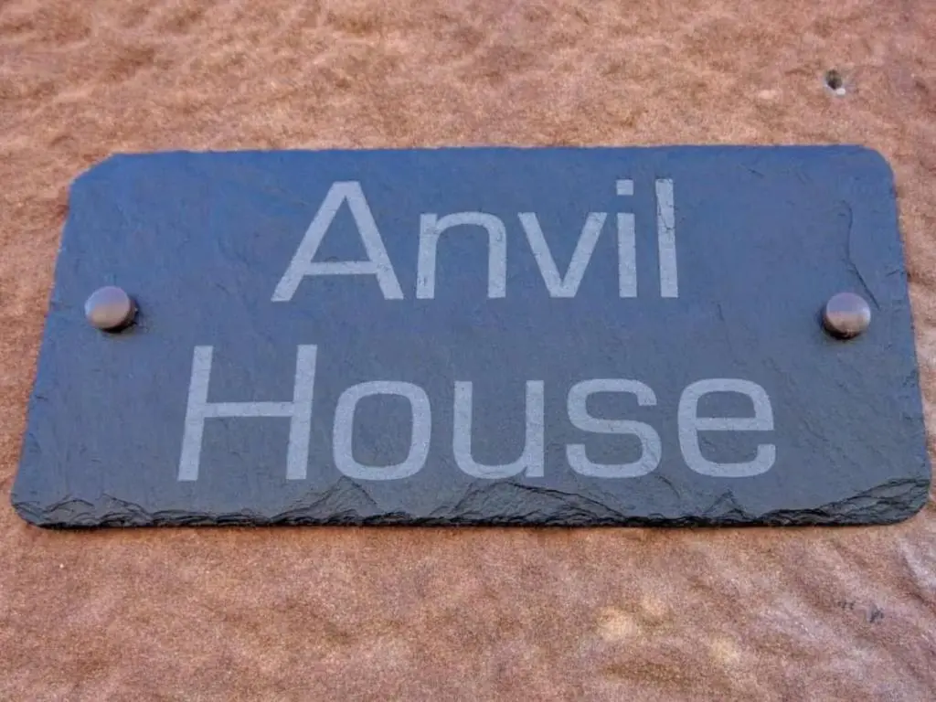 a sign that says awl house on the ground at Anvil House, Golspie in Golspie