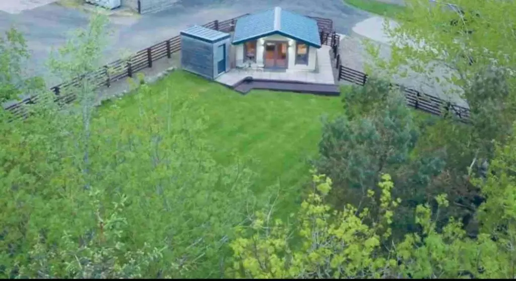 an overhead view of a small house in a yard at Backieley Lodge in Huntly