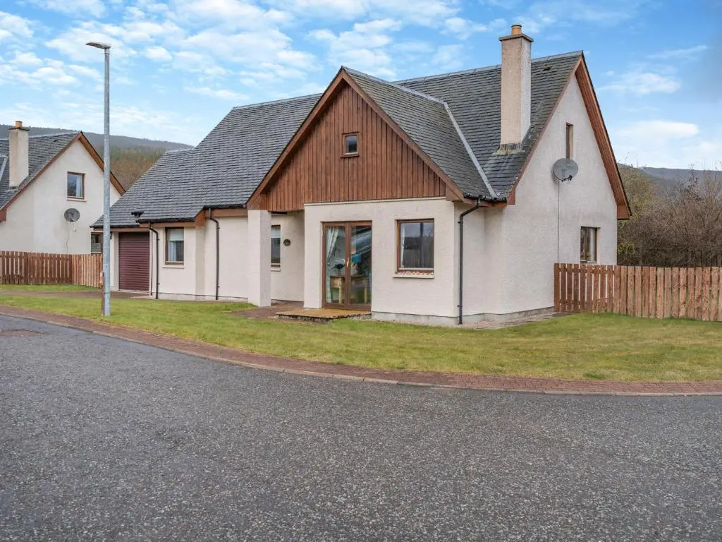 a house on the side of the road at Cairn View - S4402 in Inverdruie