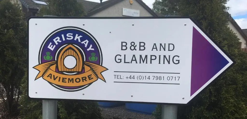 a sign for a bbq and clamberging restaurant at Eriskay Guest House and Aviemore Glamping in Aviemore