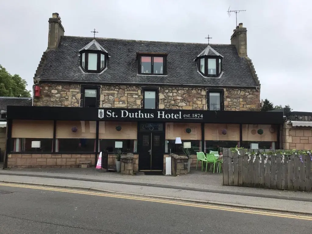 a building on the side of a street at St Duthus Hotel in Tain
