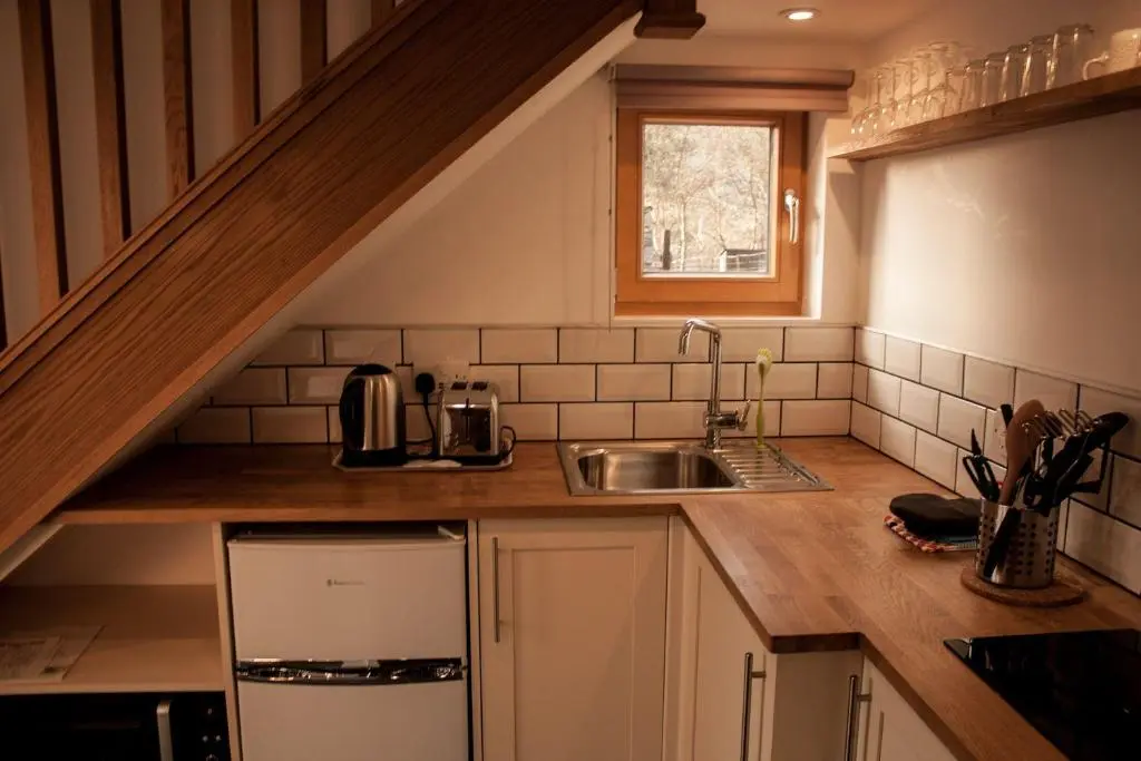 a kitchen with a sink and a counter top at Callater in Braemar