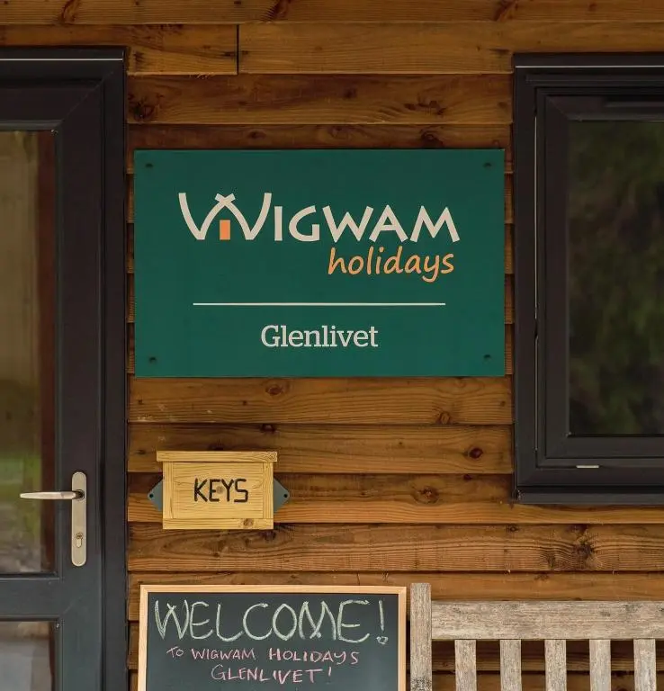 a sign on the side of a building at Glenlivet by Wigwam Holidays in Tomintoul