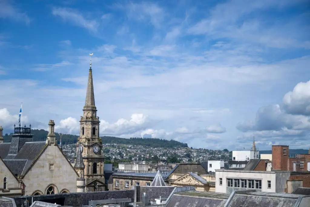 a view of a city with a clock tower at Hillside Luxury Apartments in Inverness