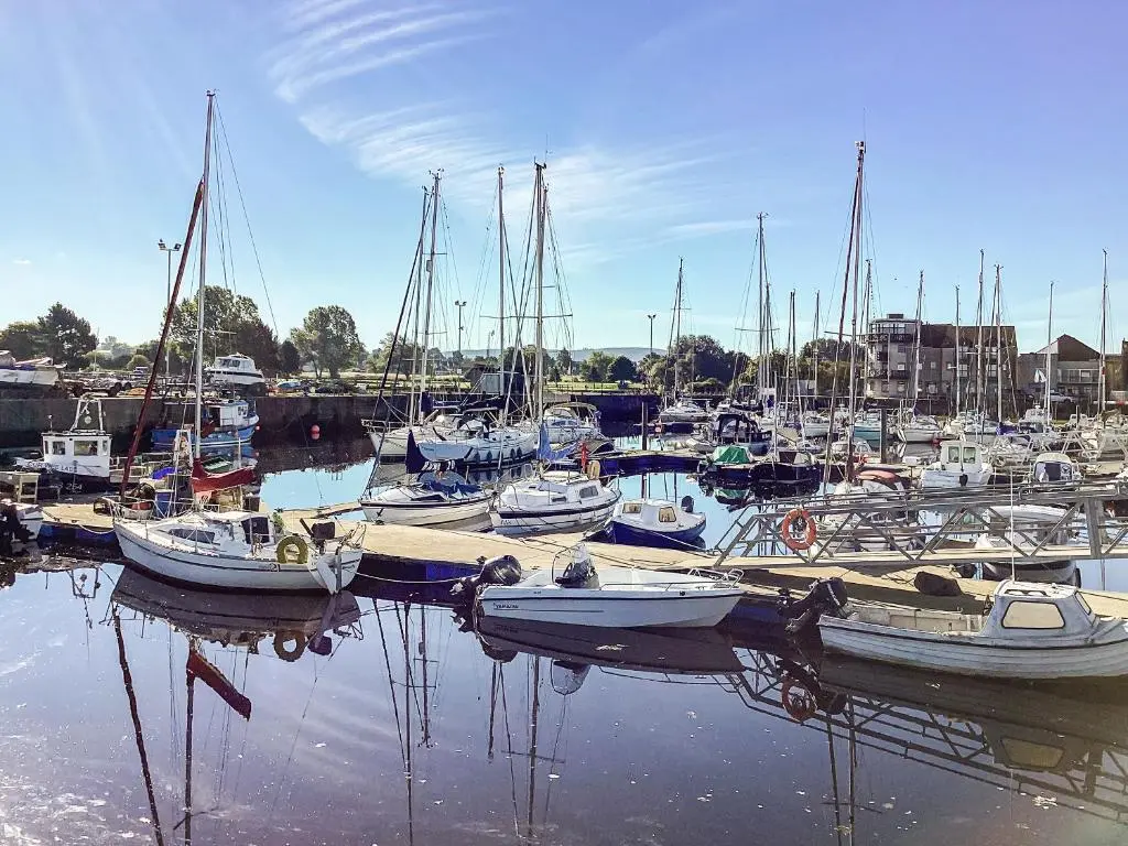 a bunch of boats docked in a harbor at Taigh Na Tunnagan in Nairn