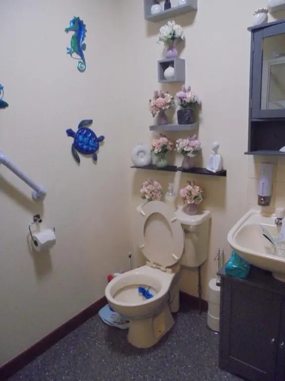 a bathroom with a toilet and a sink at 3 Station Court, Munlochy in Munlochy