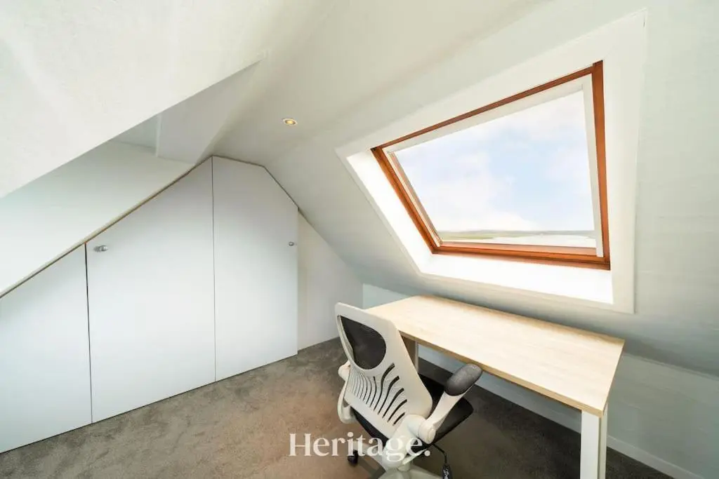 a room with a desk and a window at Beach Cottage, Pet & Family Friendly Stay in Moray in Lossiemouth