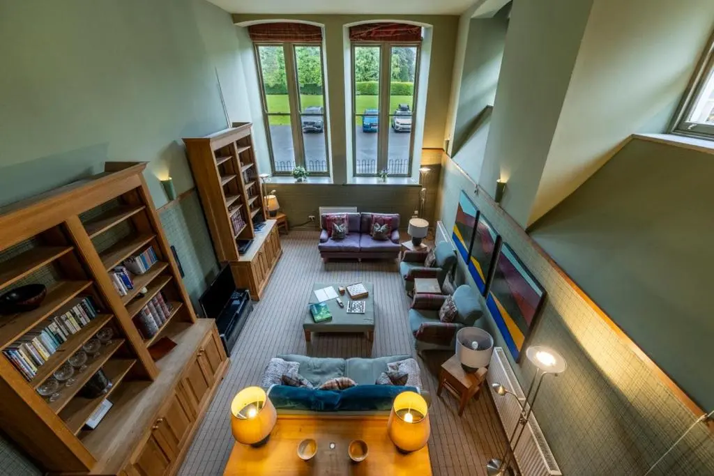 an overhead view of a living room with a couch at Old School Refectory Highland Club in Fort Augustus