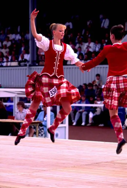 two women in tartan kilts performing in a circus at Bright comfy home, sea views and big skies in Banff
