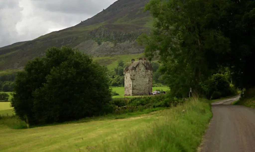 an old building on the side of a road at Forter Castle in Blairgowrie
