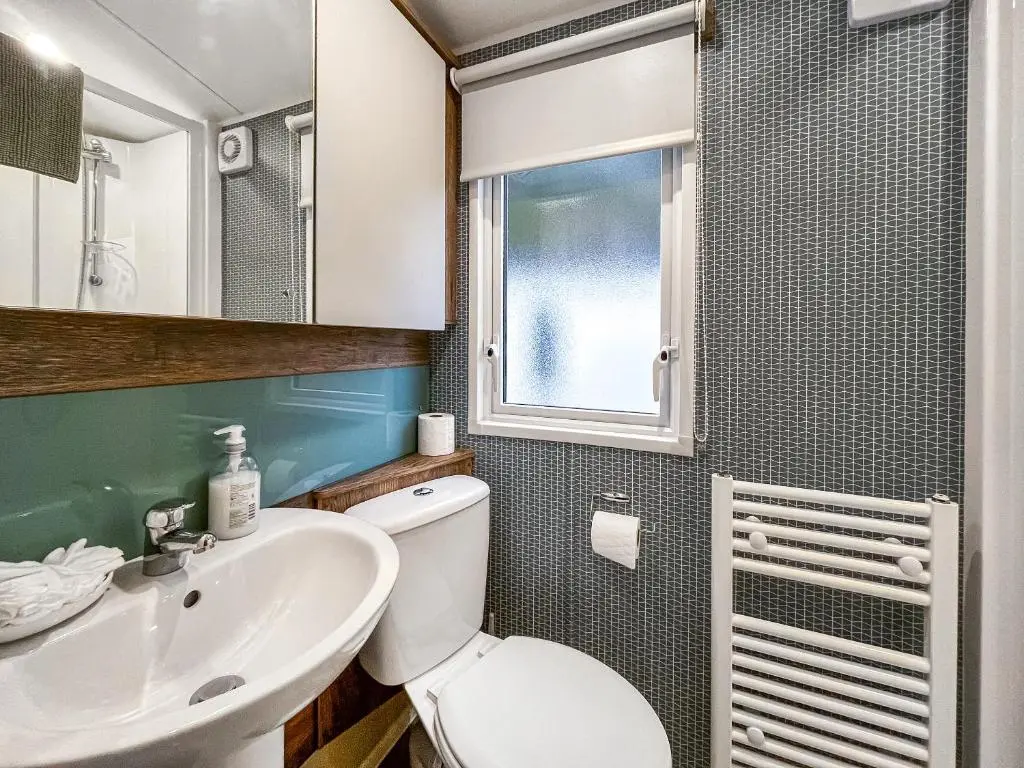 a bathroom with a toilet and a sink at The Kestrel - Ukc6920 in Forres