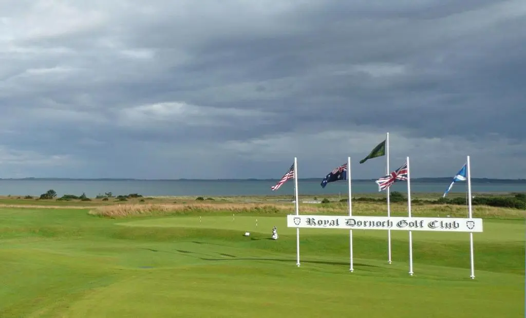 a golf course with flags on a green field at No1Dornoch in Dornoch