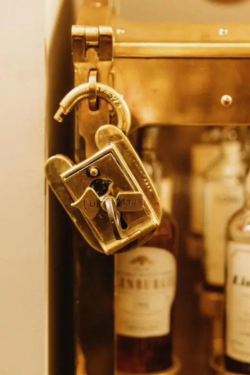 a door latch to a bottle of whiskey at The Station Hotel in Rothes