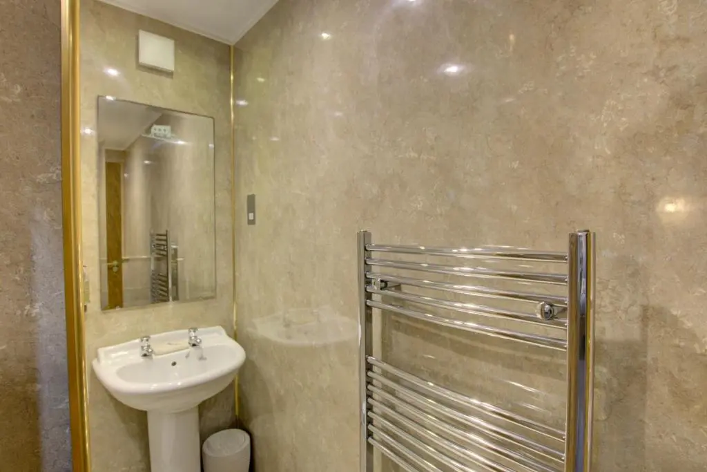 a bathroom with a sink and a shower at The Clachan, Wick in Wick