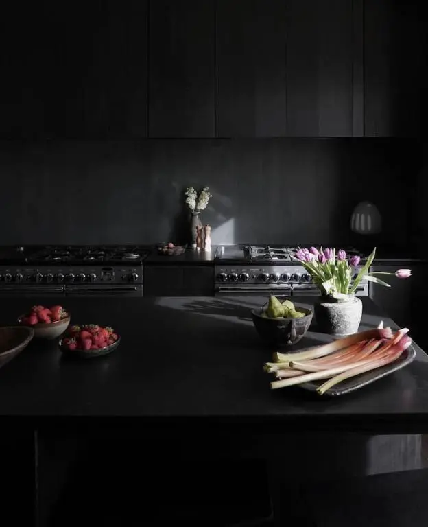 a kitchen counter with bowls of fruits and vegetables on it at Luxury lodge for 16 in Royal Deeside in Ballater