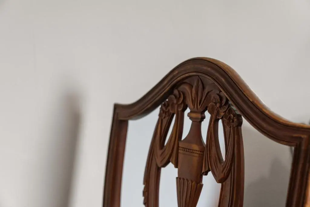 a close up of the back of a wooden chair at Central 1 Bedroom Apartment - Inverness in Inverness