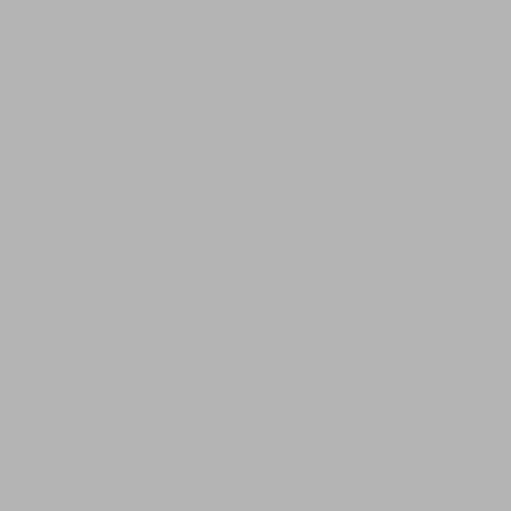 a patio with an umbrella and a table and a bench at Ivy House in Kingussie