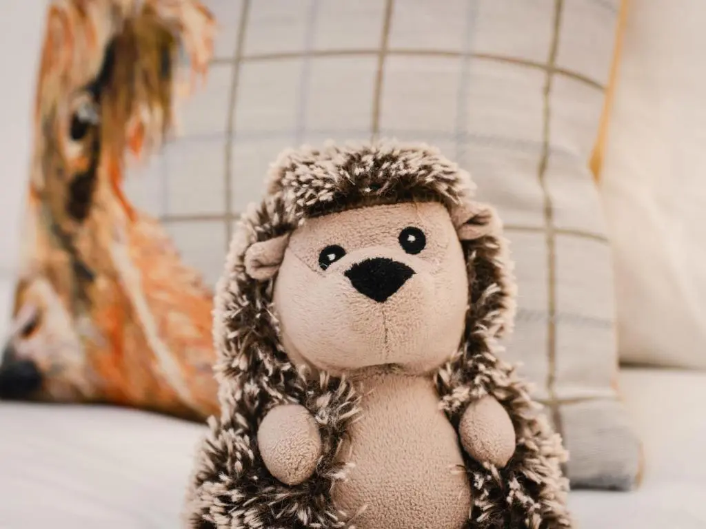 a stuffed animal is sitting on a table at Villa Drover's Lodge by Interhome in Drumnadrochit