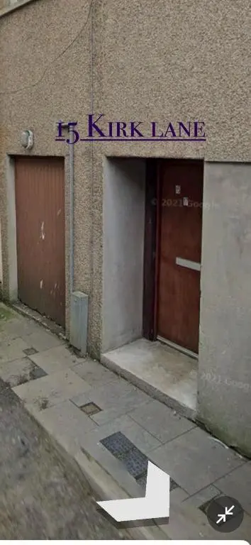 a building with a sign that reads kirk lane at Impala Apartment in Wick