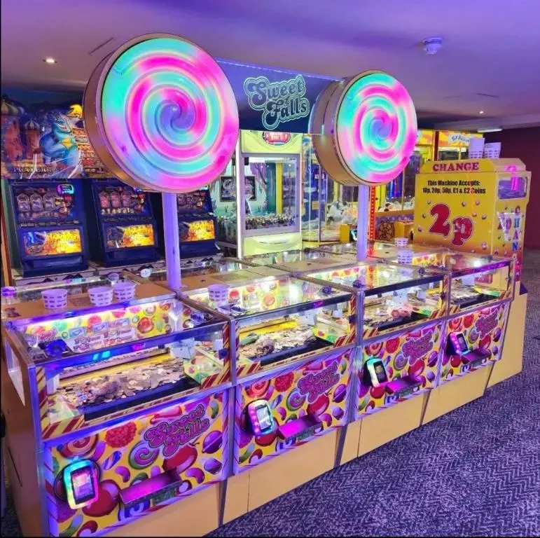 a pinball court with a bunch of pinball machines at 36 Lighthouse View in Lossiemouth