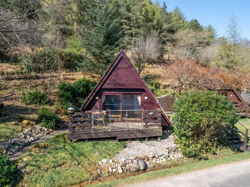 a small cabin in the middle of a hill at Chalet Oystercatcher by Interhome in Spean Bridge
