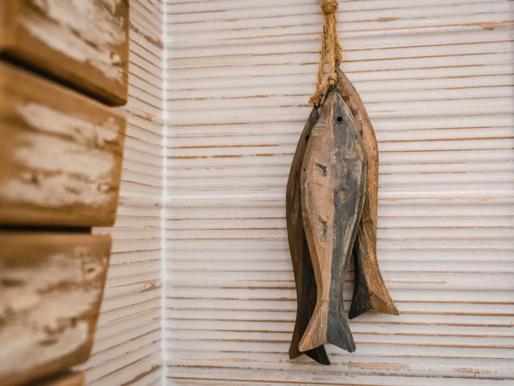 a dried fish hanging on a wall at Chalet Oystercatcher by Interhome in Spean Bridge
