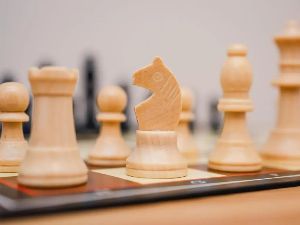 a wooden chess piece on a chess board at Apartment Wayside Loft by Interhome in Drumnadrochit